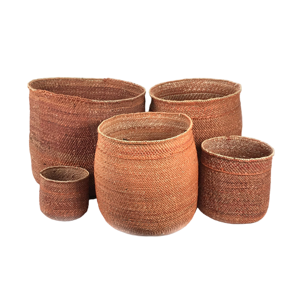 Set of woven brown baskets of various sizes on a white background