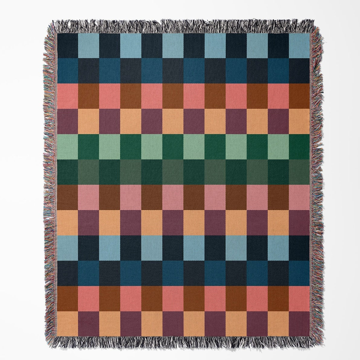 Multicolored checkered blanket on a white background