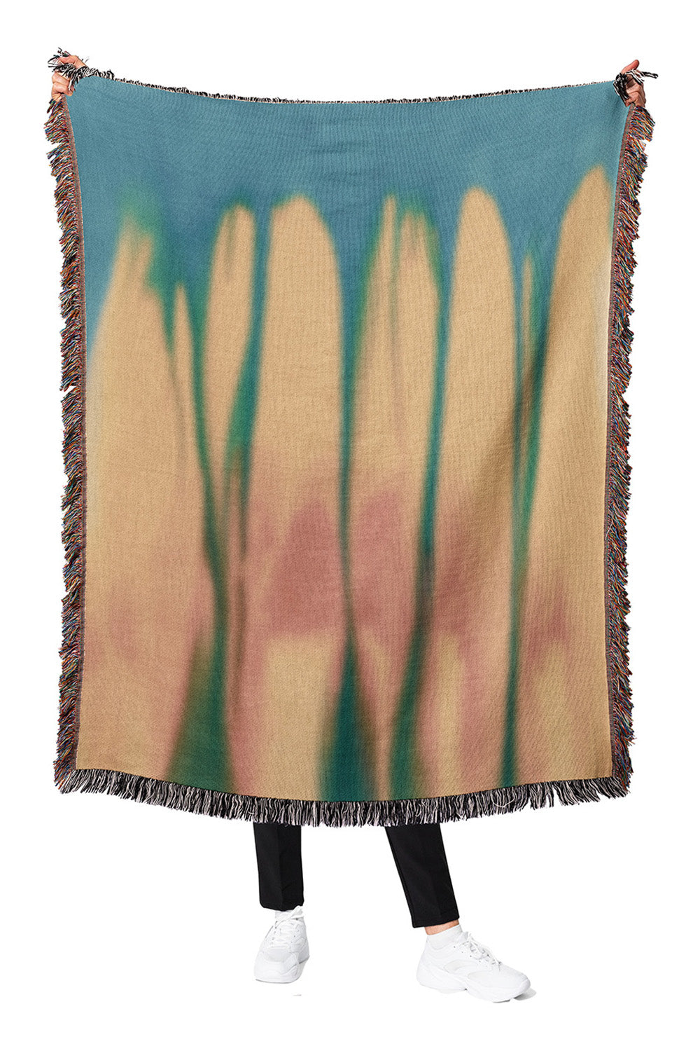 Cotton woven throw blanket featuring a modern heat map-inspired pattern in warm and cool tones.
