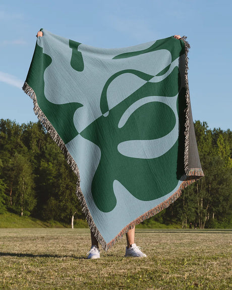 Blue and Green Organic Fusion Cotton Woven Throw Blanket showcasing a two-tone abstract design with organic shapes.