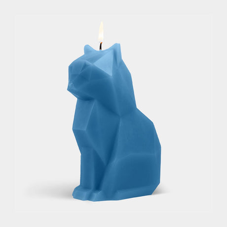 Blue cat-shaped candle on a white background