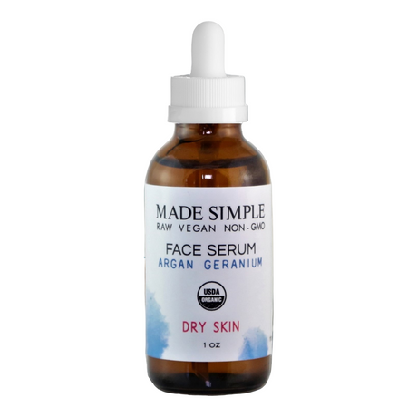 Bottle of Made Simple face serum with a dropper on a white background