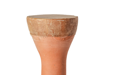 Terracotta drum on a white background