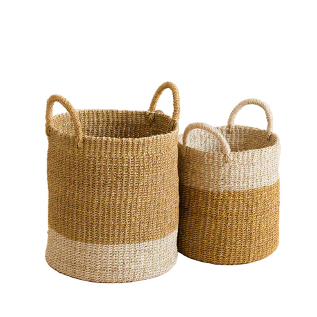 Two woven baskets with handles on a white background