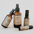 Collection of natural remedy bottles with labels on a white background