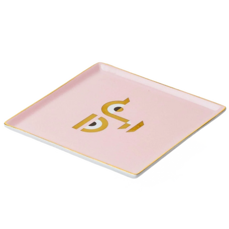 Pink rectangular tray with gold lettering on a white background