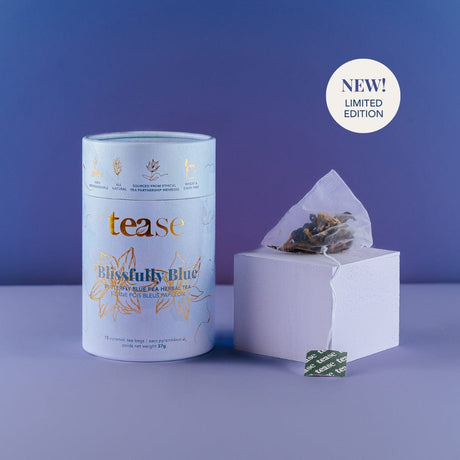 Tea canister labeled 'tease' with a tea bag on a purple background