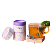 Tea canister labeled 'tease' with a cup of tea and lavender on a white background
