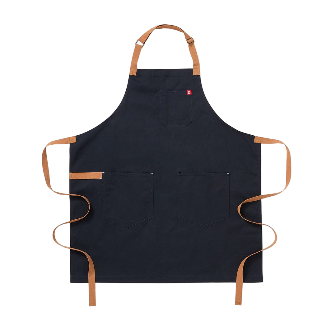 Black apron with brown straps on a white background