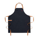 Black apron with brown straps on a white background