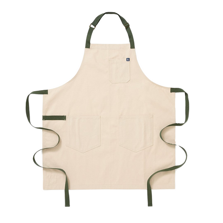 Beige apron with green straps on a white background