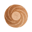 Round woven placemat with concentric circle pattern on a white background