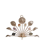 Decorative wall sconce with crystal stones on a white background