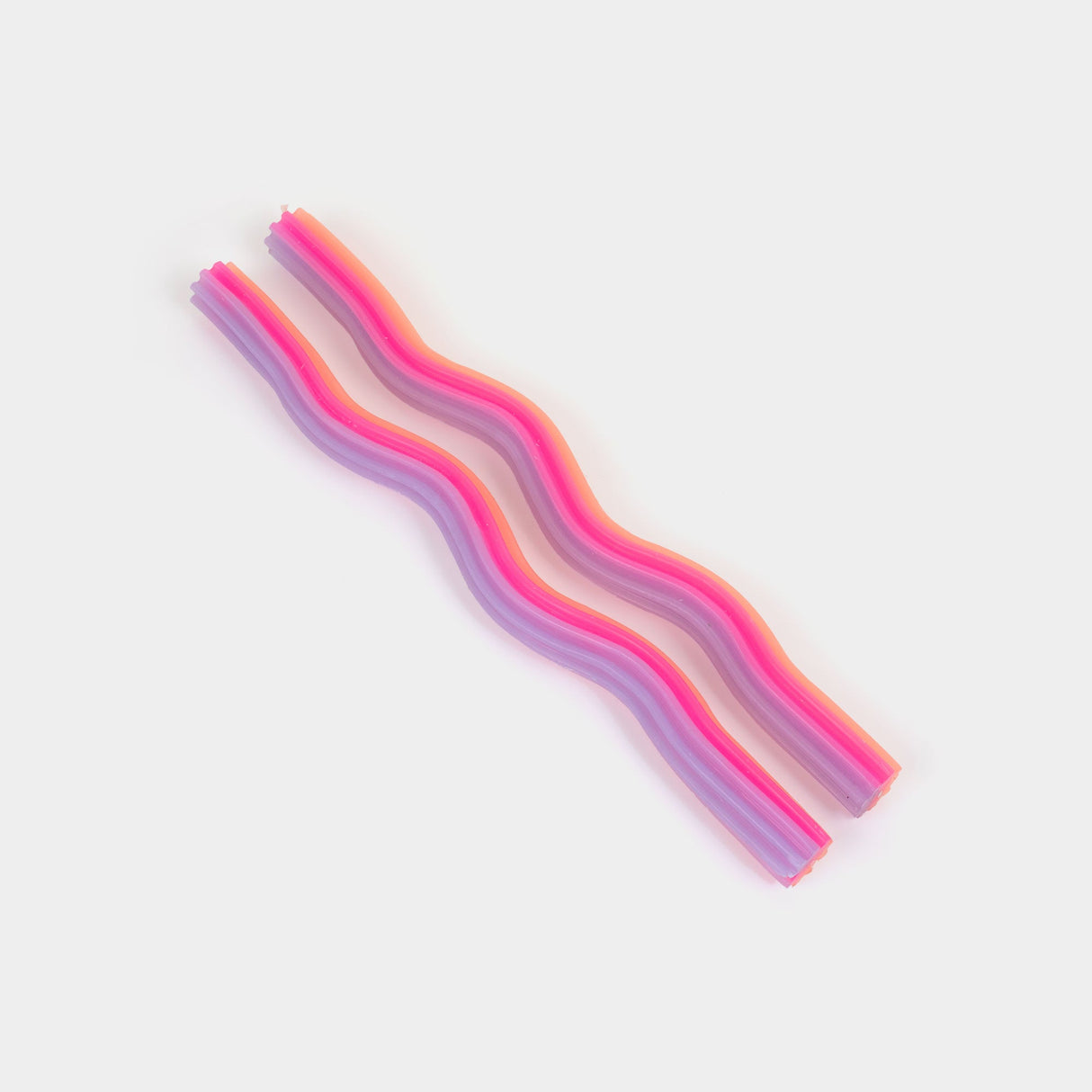 Set of colorful straws on a light gray background