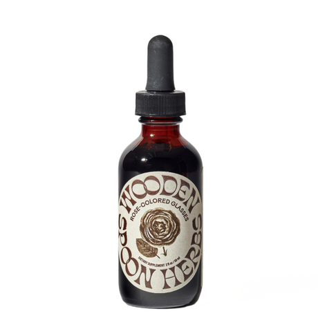 Bottle of Wooden Herbs on a white background